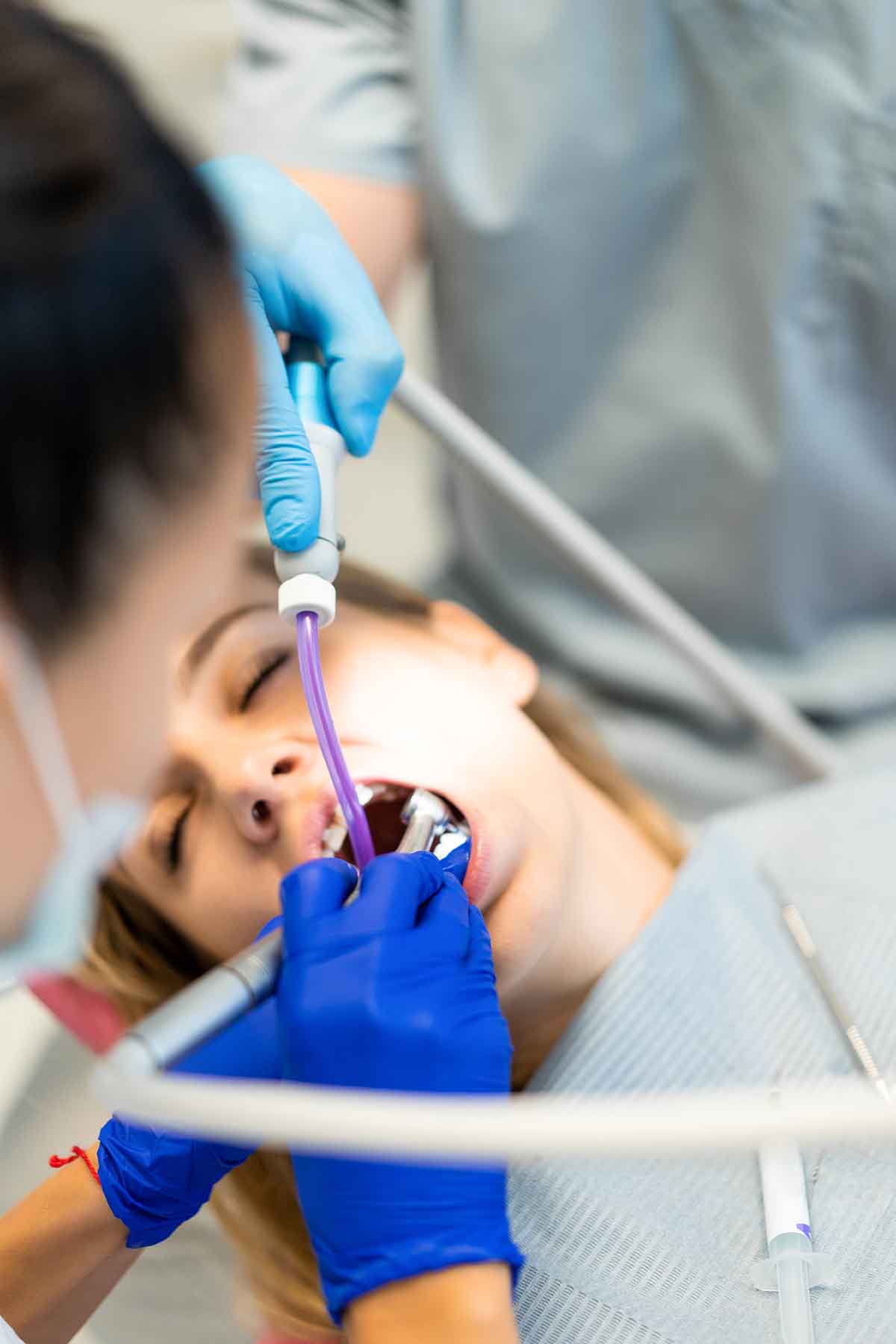 dentist in the process. Dental services, dental office, dental treatment.